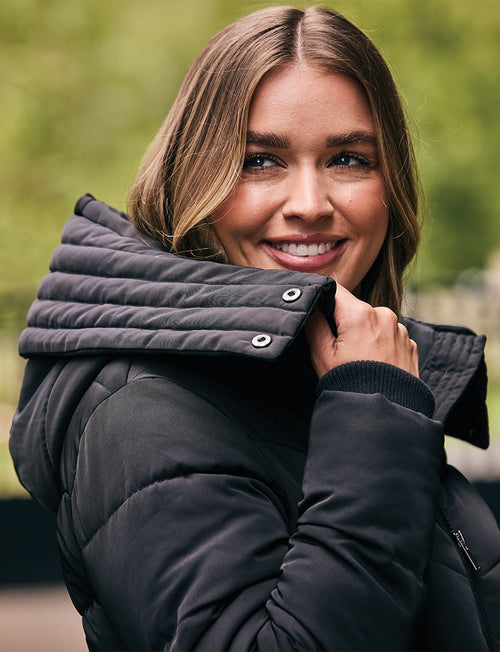 1028855000-BLACK_DB-Longline-Puffer-Lifestyle-Detail3_Image_Null_Hero.jpg