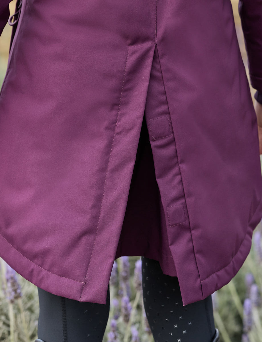 1028865000-PURPLEVIOLET_DB-Everyday-Waterproof-Jacket-Back-Split-Open-Lifestyle_Image_Null_Hero.jpg